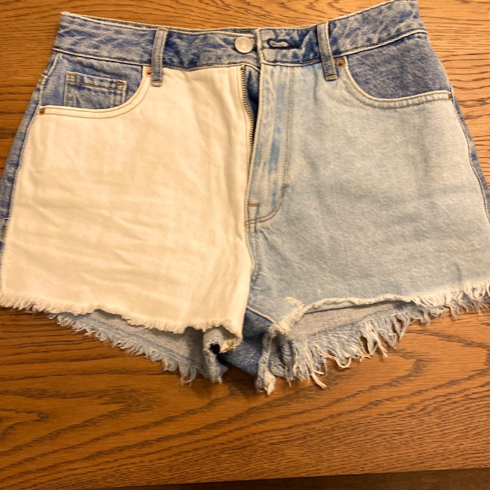 PacSun Women’s sz 25 cutoff jean shorts. White one side in front/blue jeans back